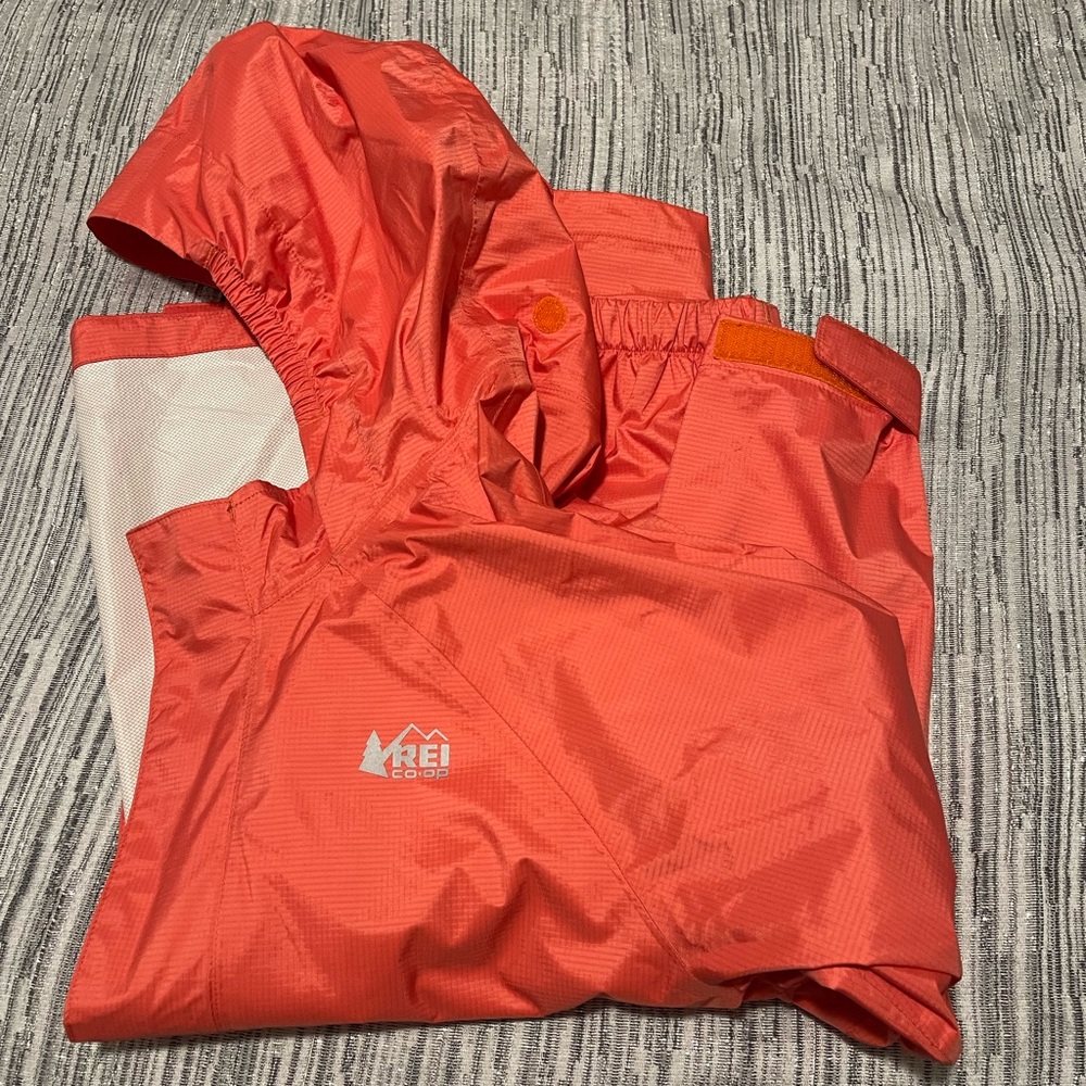 REI rain jacket. Wore probably three times at most